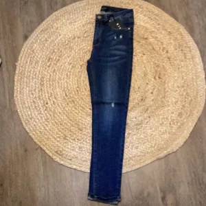 Risen Mid-Rise Ankle Skinnies